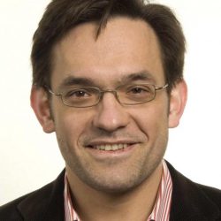 Profile picture in black and white of Alexander Schekochihin